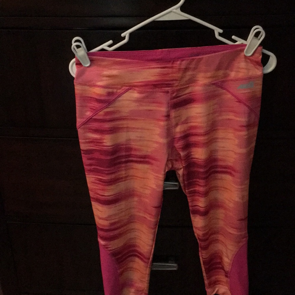 Variety of name brand workout pants.